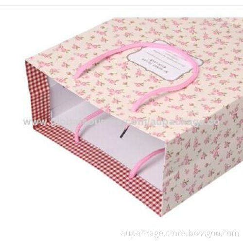 Paper bag with string, quality matte white cardboard and covered